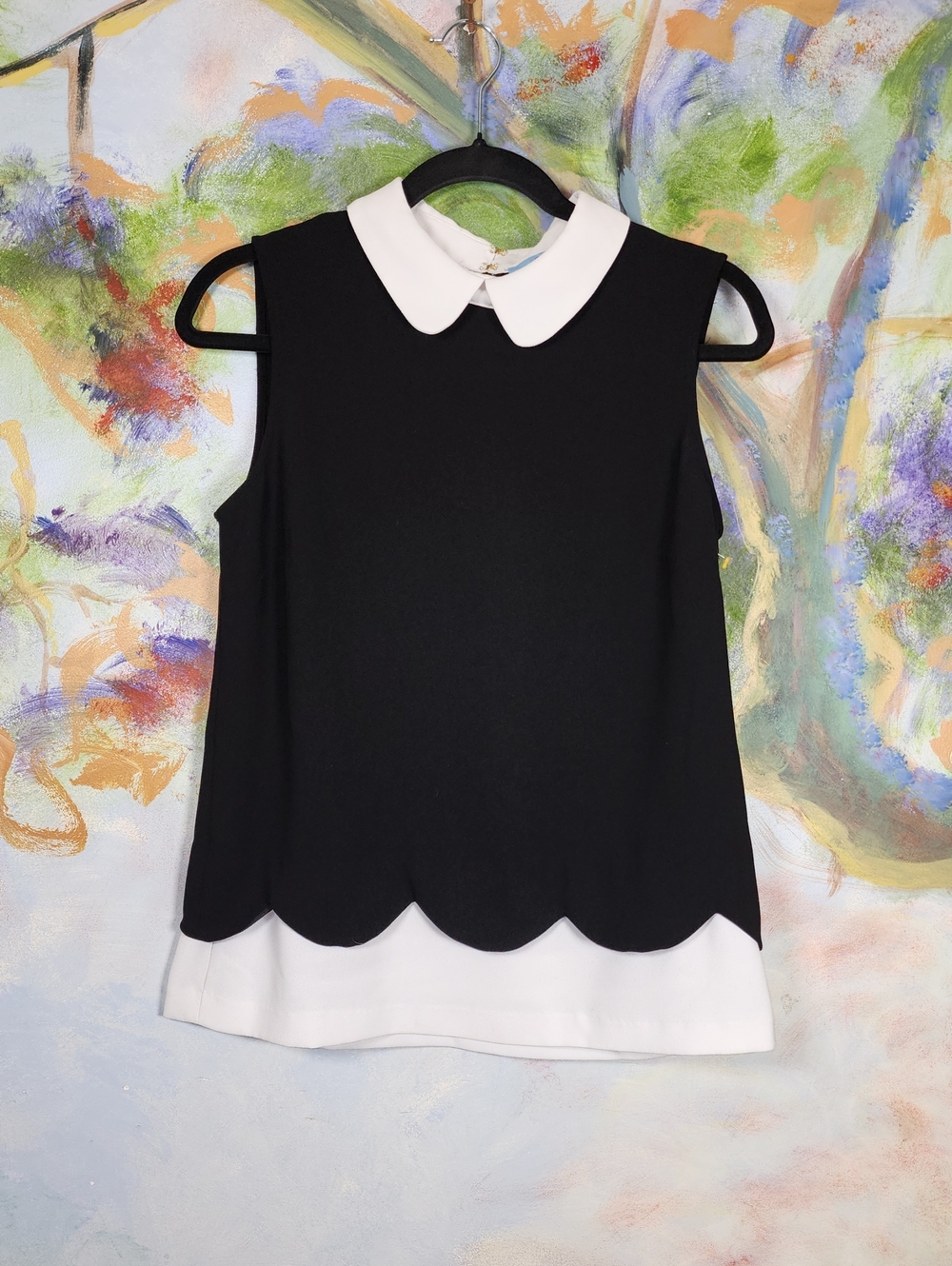 CeCe Black Sleeveless Blouse with White Peter Pan Collar and Scalloped Hem